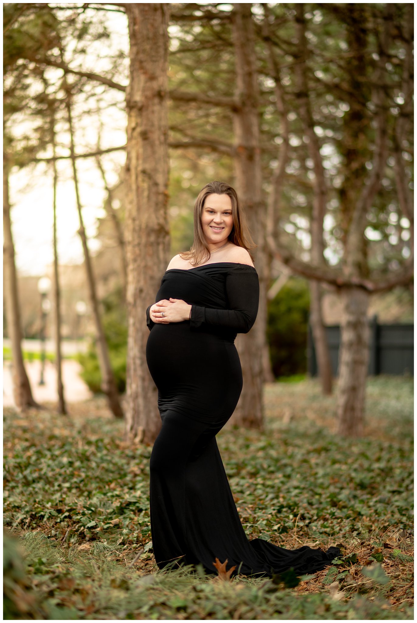 A maternity picture among ivy in Franklin Square in Syracuse, New York.